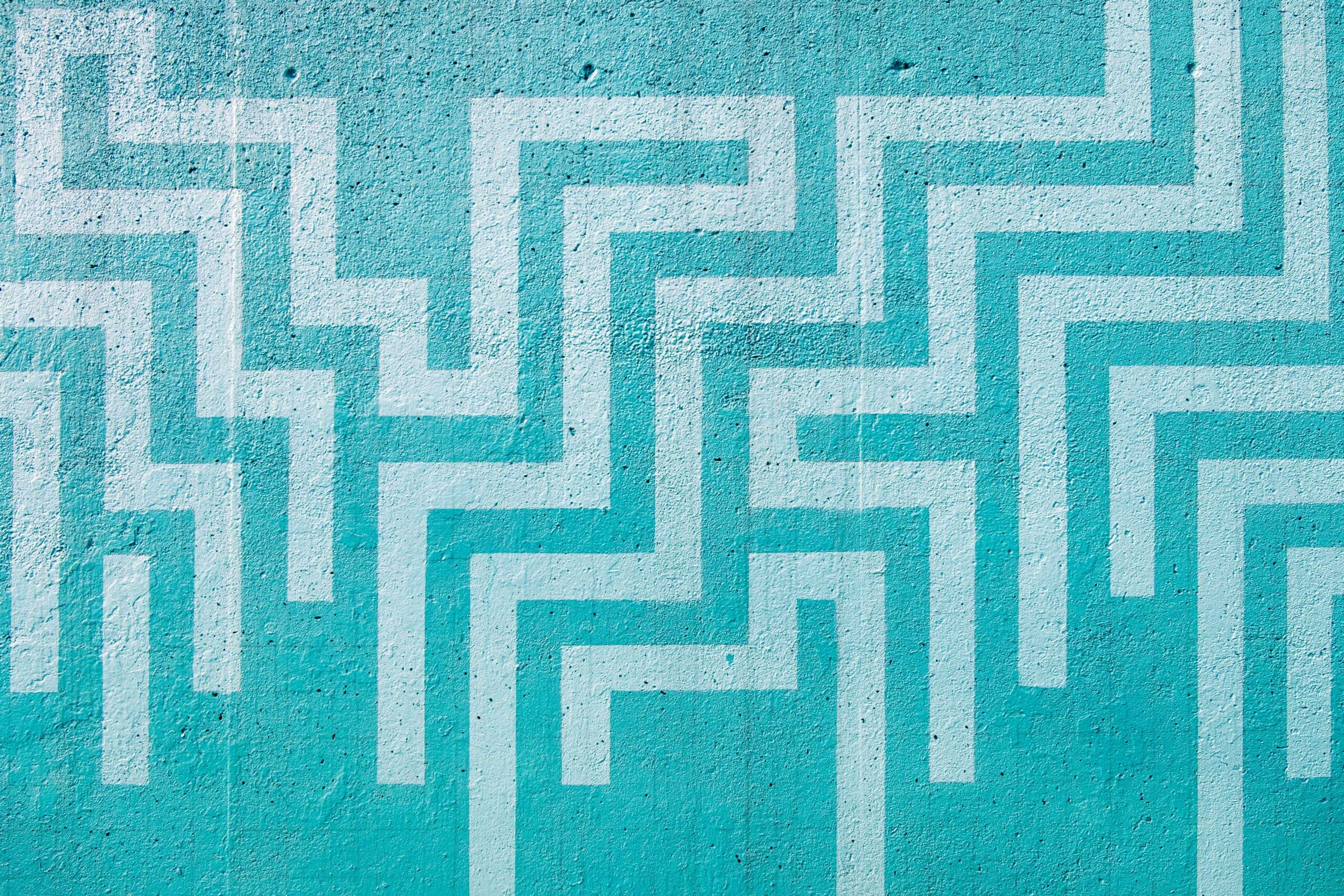 Image of a blue maze painted on a wall to signify stress addiction.